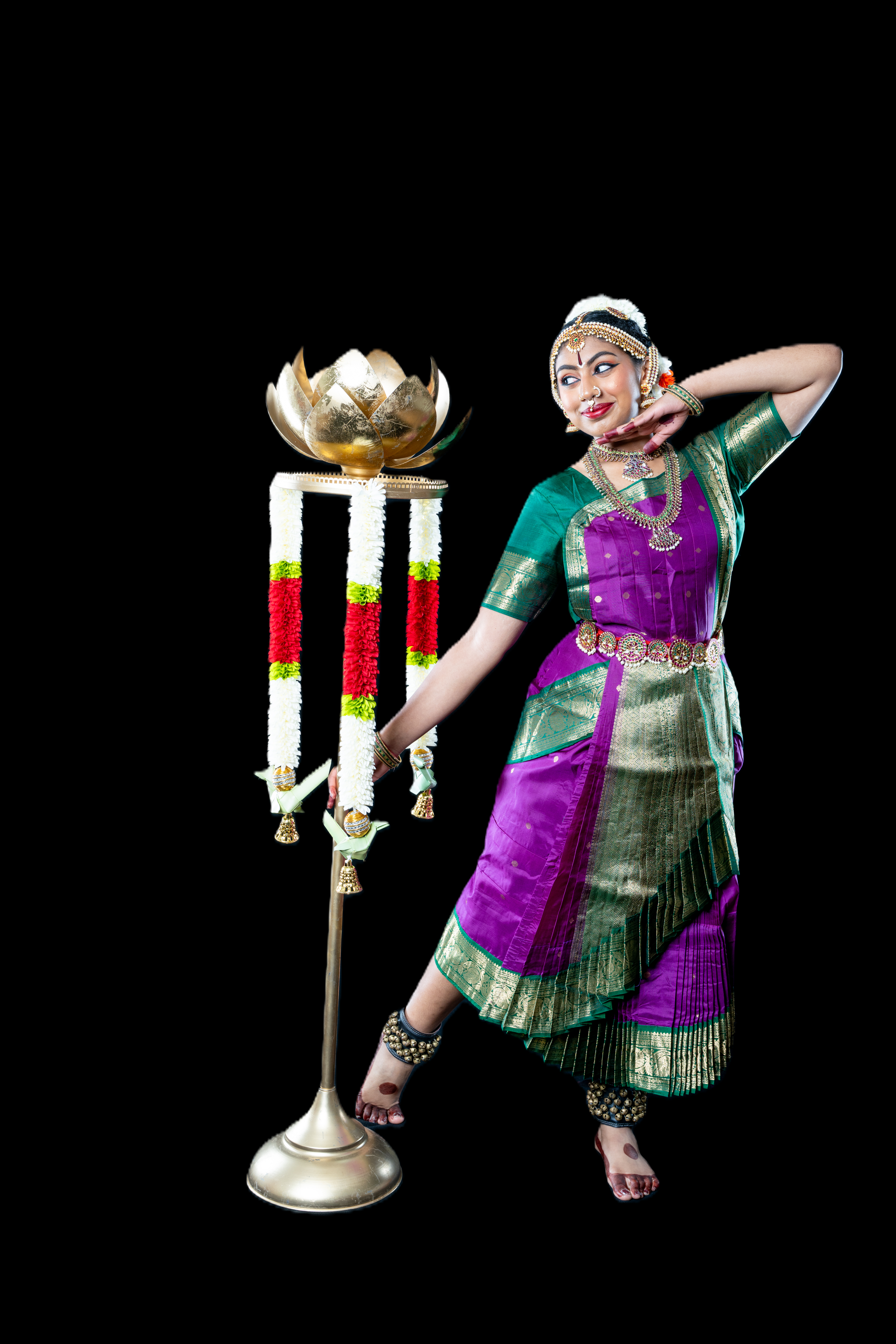 Dancer in a purple and green costume