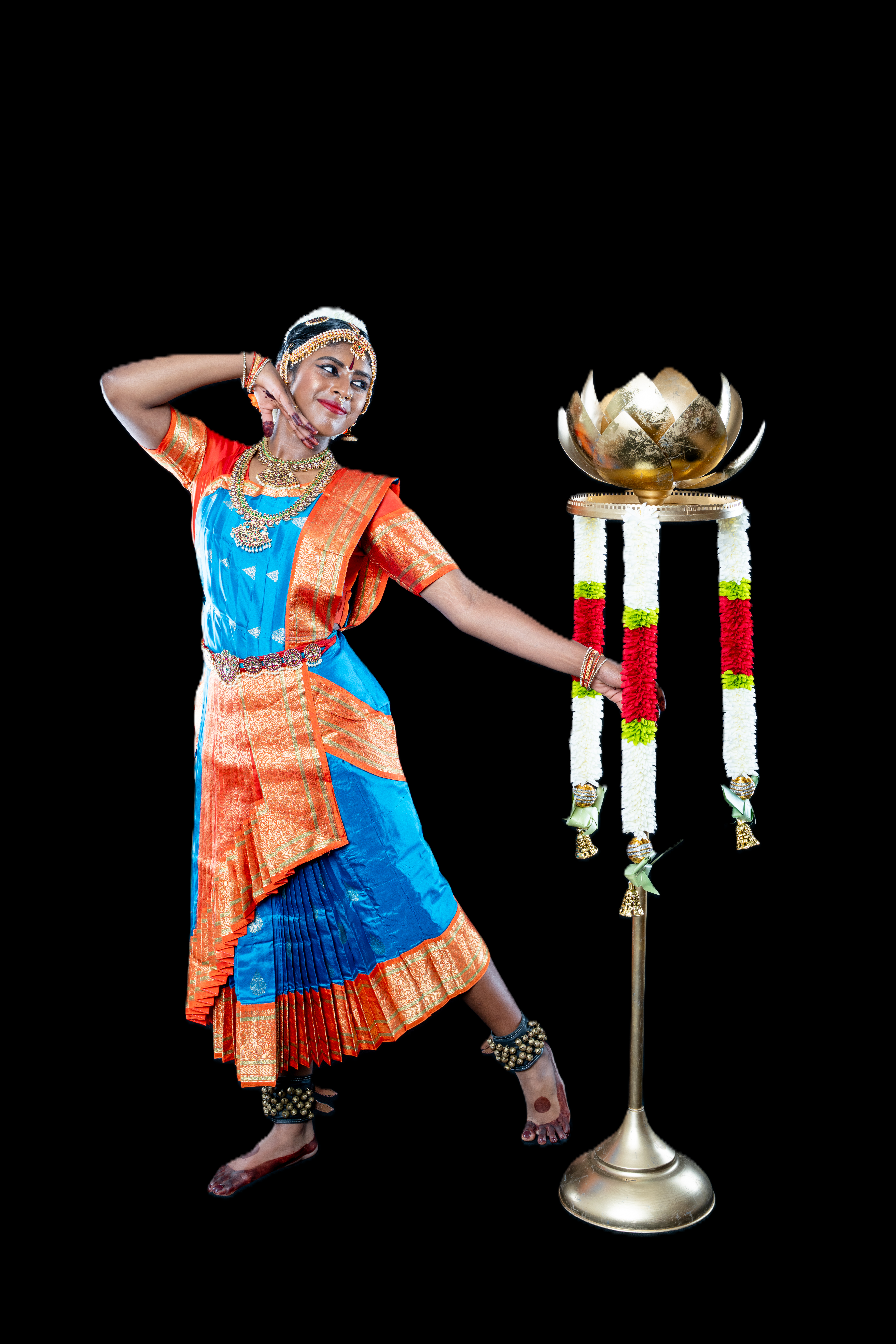 Dancer in blue and orange costume
