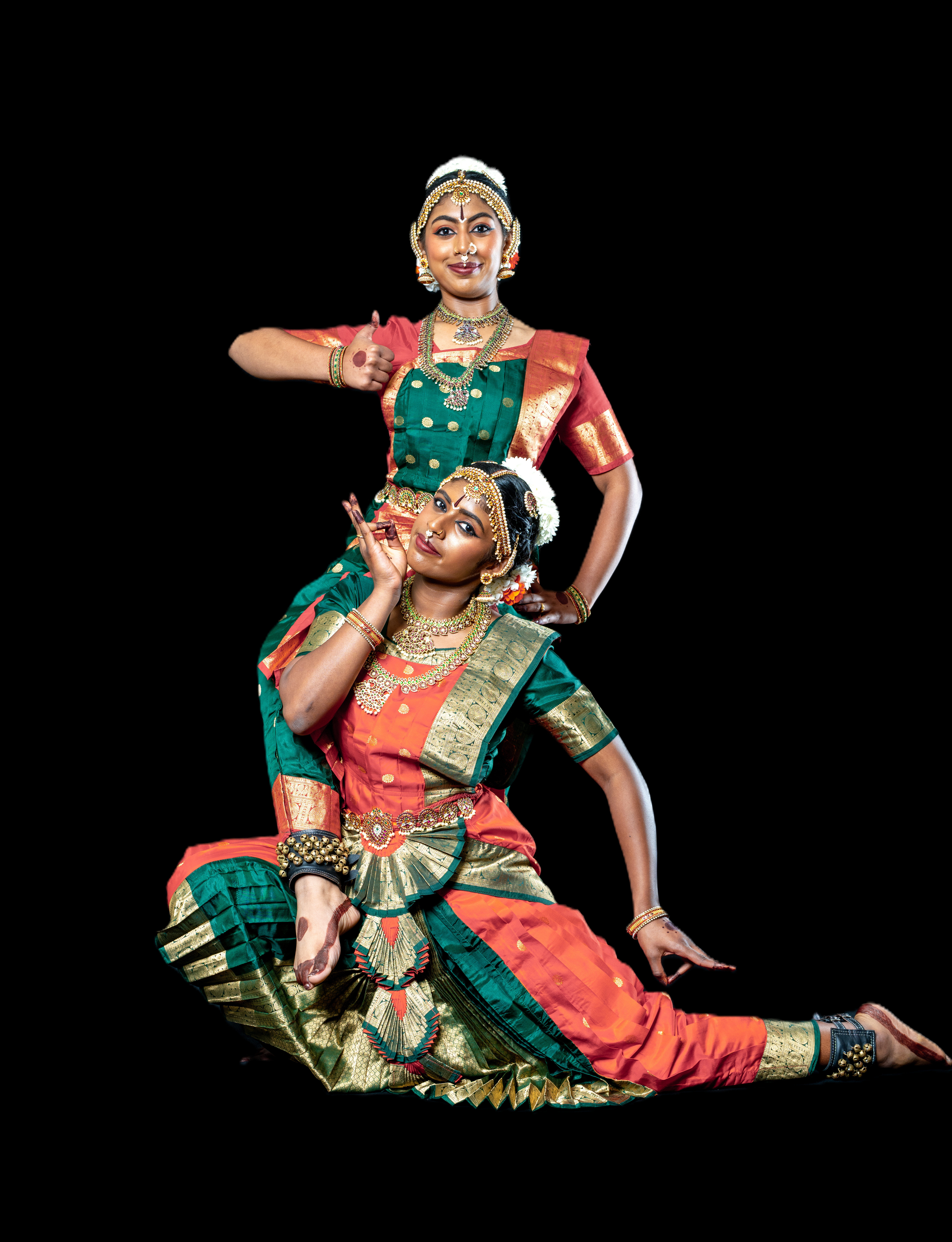Dancer mid-performance green & orange